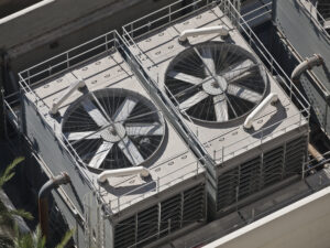 Typical huge commercial air conditioners in bright desert sun.